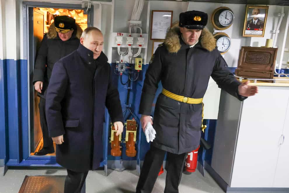 Russian president Vladimir Putin, left, visits the Sevmash shipyard in Severodvinsk (Sputnik, Kremlin Pool Photo via AP)