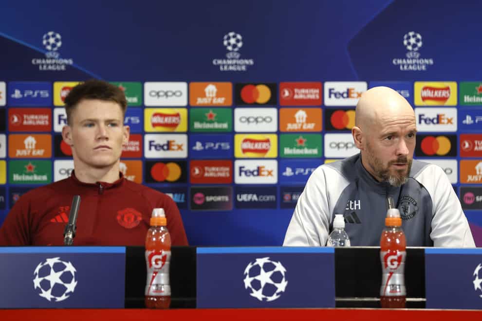 Manchester United’s Scott McTominay, left, is right behind manager Erik ten Hag (Richard Sellers/PA)