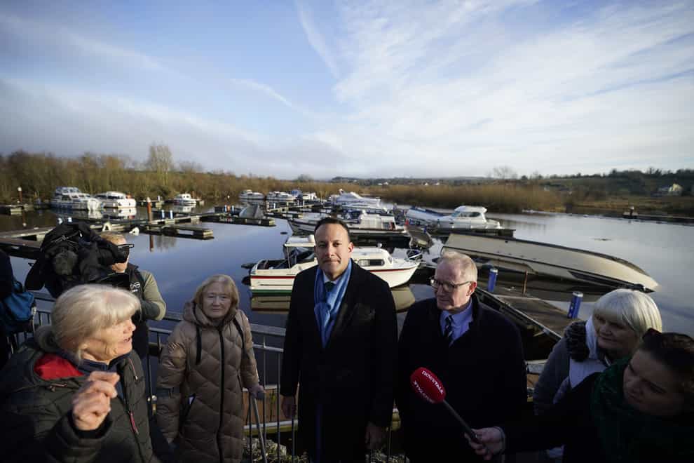 Taoiseach Leo Varadkar inspects damage to the marina in Leitrim after high winds hit the area on Sunday (Niall Carson/PA)