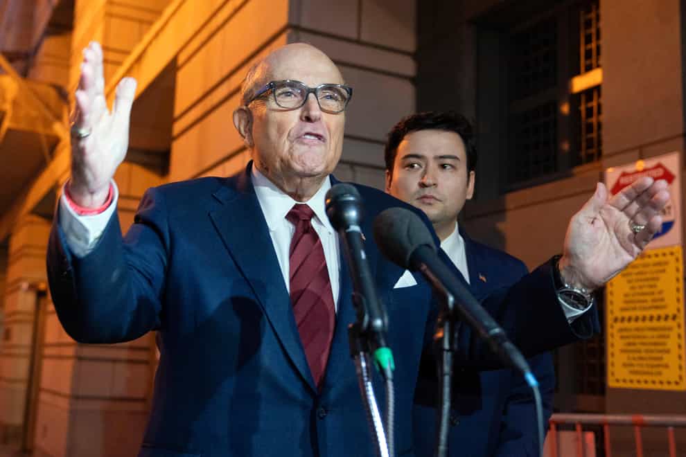Former New York Mayor Rudy Giuliani was scolded by the judge over comments he made to reporters (AP Photo/Jose Luis Magana)