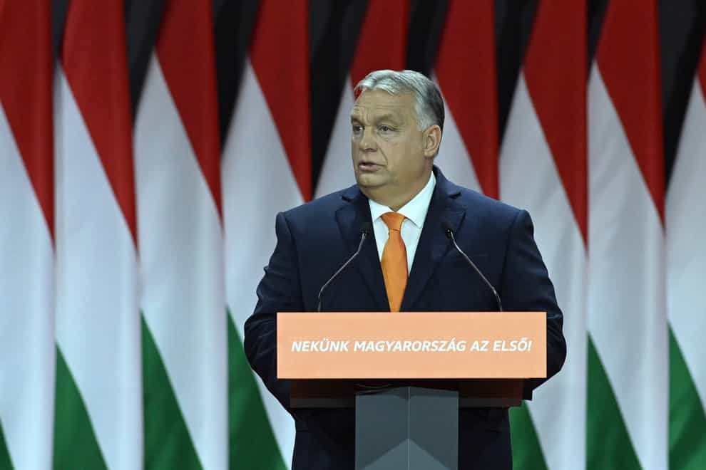 Prime Minister Viktor Orban says Hungary will block a proposal to start talks on European Union membership for Ukraine (Szilard Koszticsak/MTI via AP)
