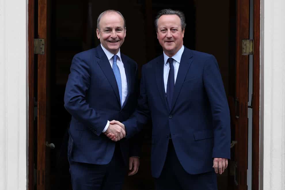 Foreign Secretary Lord David Cameron greets Irish Tanaiste Michael Martin at 1 Carlton Gardens in central London (Adrian Dennis/PA)