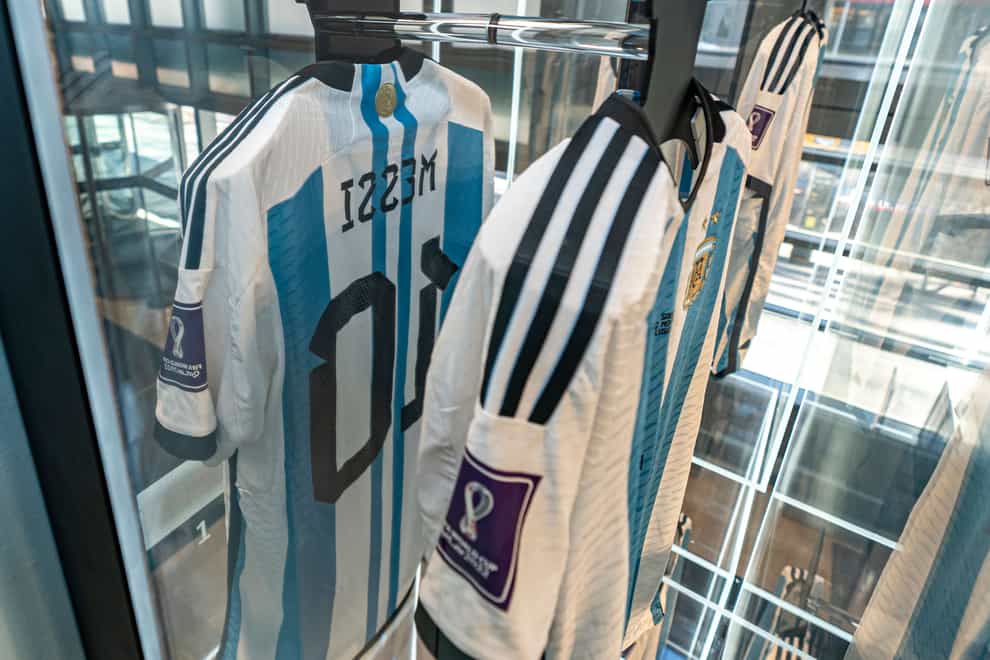 A shirt worn by Lionel Messi in a match for Argentina against Saudi Arabia in the 2022 Fifa World Cup on display at Sotheby’s in New York (Peter K Afriyie/AP)