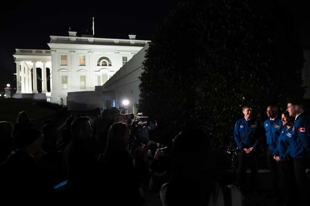 Artemis II crew members, from left, Reid Wiseman, Victor Glover, Christina Hammock Koch,and Jeremy Hansen speak to the media outside the West Wing of the White House (Andrew Harnik/AP)