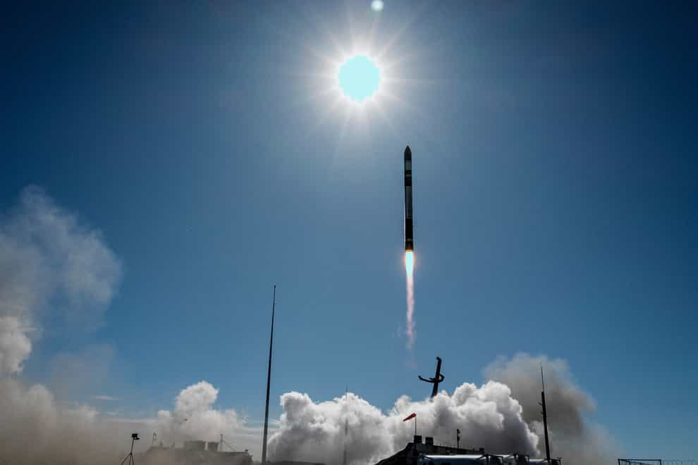 A rocket successfully takes off from a launch site on the Mahia Peninsula, New Zealand, on Friday (Rocket Lab via AP)