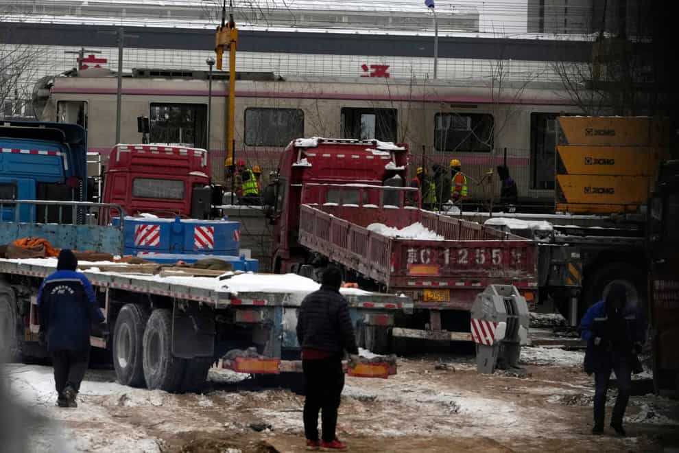 The site of a train collision in the western district in Beijing (Ng Han Guan/AP)