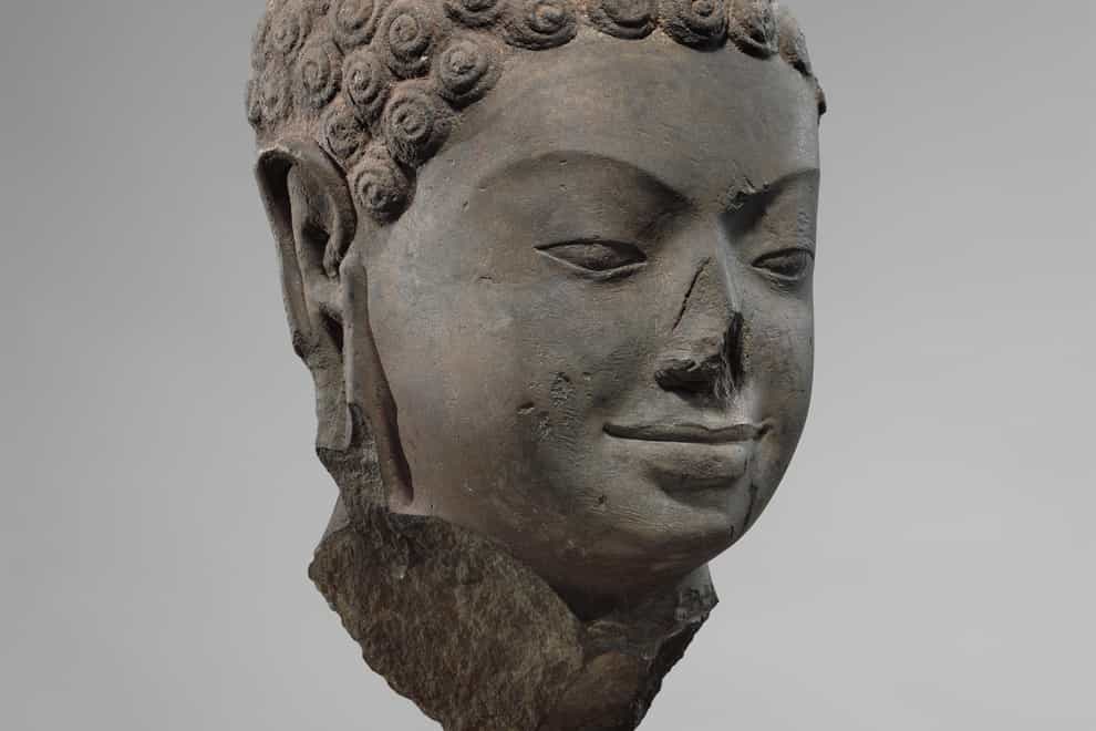 A seventh century sculpture titled Head of Buddha at the Metropolitan Museum of Art in New York (Metropolitan Museum of Art via AP)