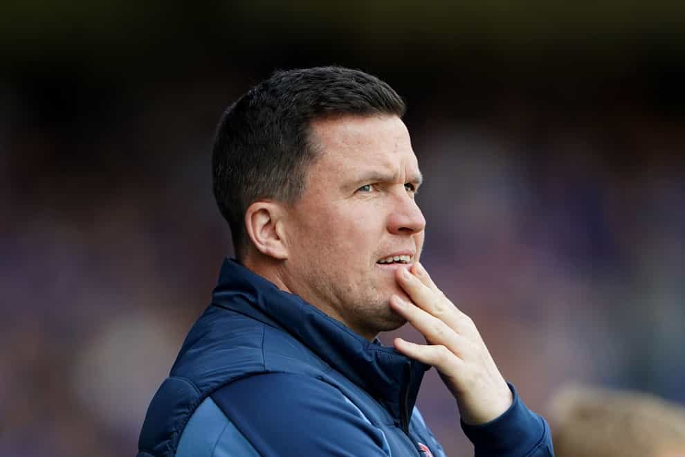 Exeter manager Gary Caldwell did not agree with the red card (PA)