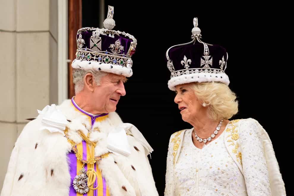 King Charles III and Queen Camilla on the balcony of Buckingham Palace following the coronation (Leon Neal/PA)