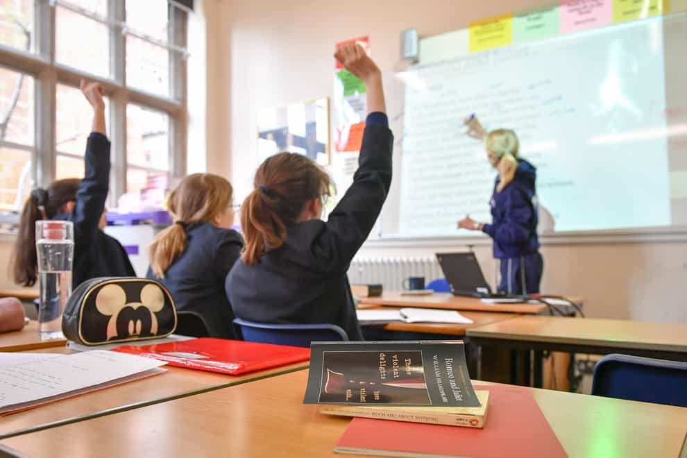 Disadvantaged pupils’ struggles at school have “little to do” with them lacking the character, attitude or self-belief of their wealthier peers, a report has found (Ben Birchall/PA)