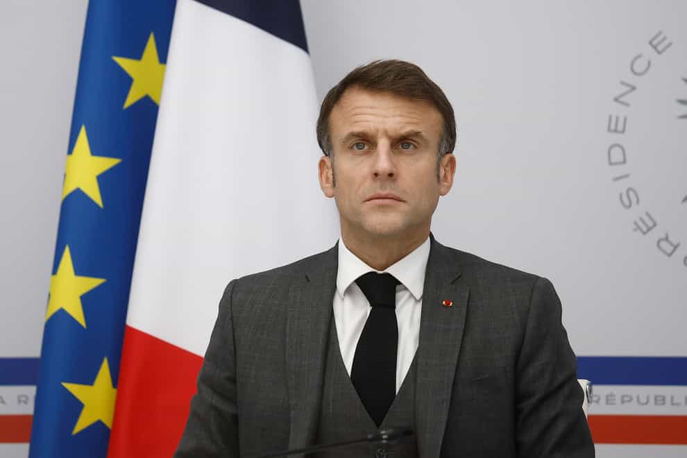 French President Emmanuel Macron discussed plans for – and security threats to – the Olympic opening ceremony (Yoan Valat, Pool via AP)