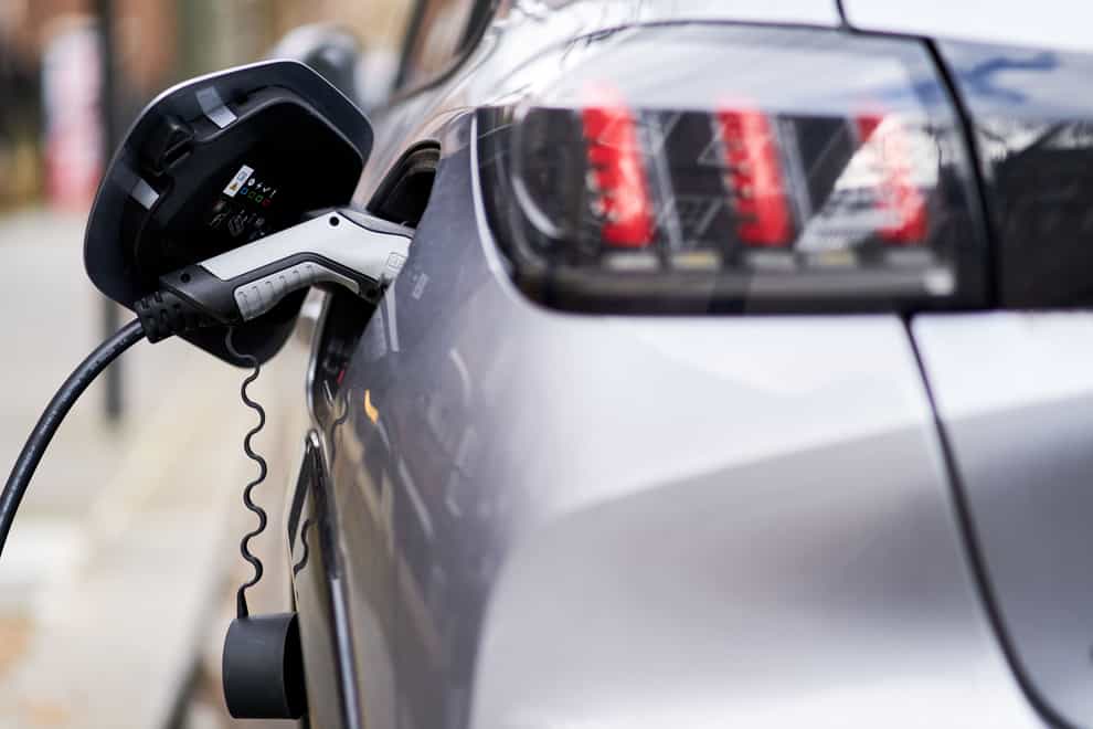 Tariffs on electric cars from next year will be avoided after the UK and the EU agreed to extend trade rules, Rishi Sunak has announced (John Walton/PA)