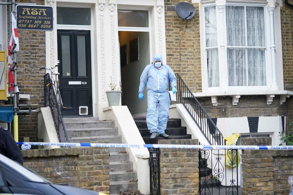 Forensic officers at a property on Montague Road, east London, where a four-year-old boy suffered fatal knife injuries (Yui Mok/PA Wire)