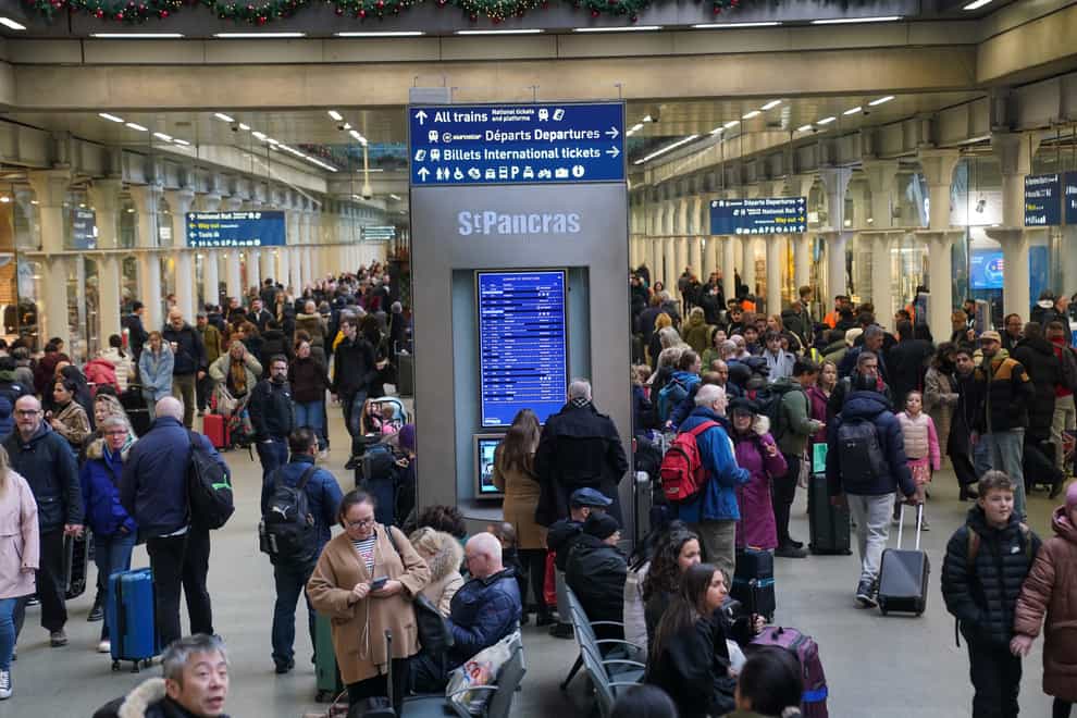 Passengers at St Pancras International station, London, as Christmas getaway chaos is expected to continue (Lucy North/PA)