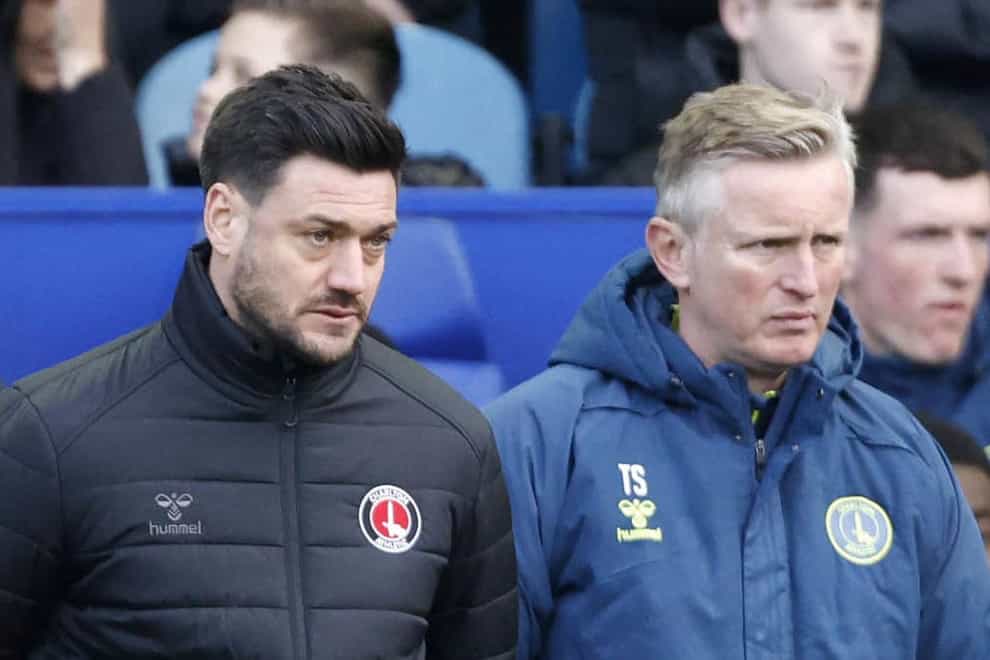 Terry Skiverton (right) standing alongside AFC Wimbledon manager Johnnie Jackson, who was red-carded at Crawley (Richard Sellers/PA)