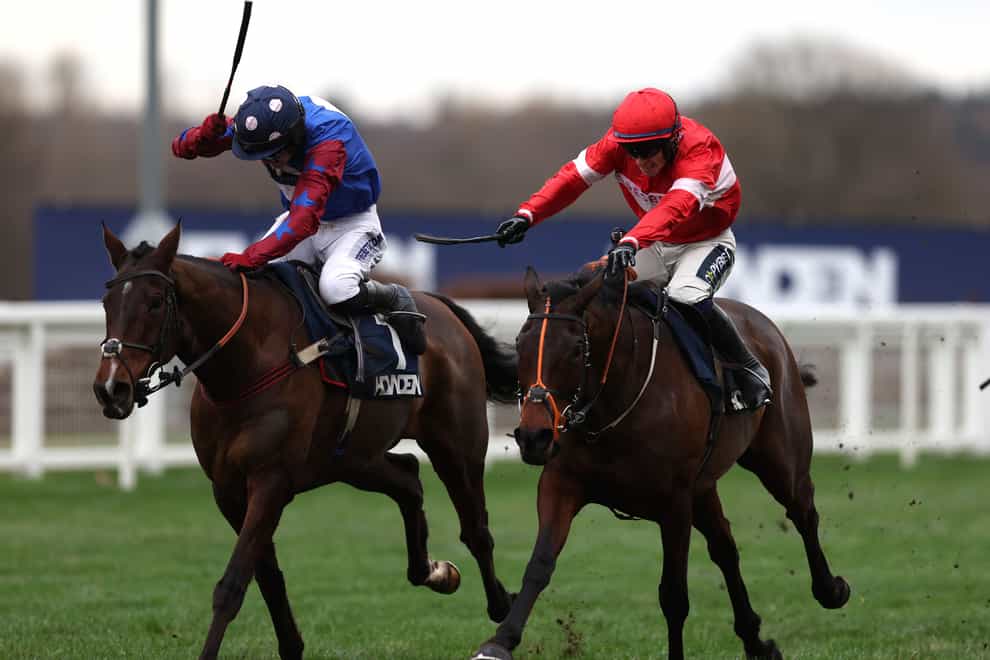 Crambo ridden by Jonathan Burke (right) wins The Howden Long Walk Hurdle on day two of the Howden Christmas Racing Weekend at Ascot Racecourse. Picture date: Saturday December 23, 2023.