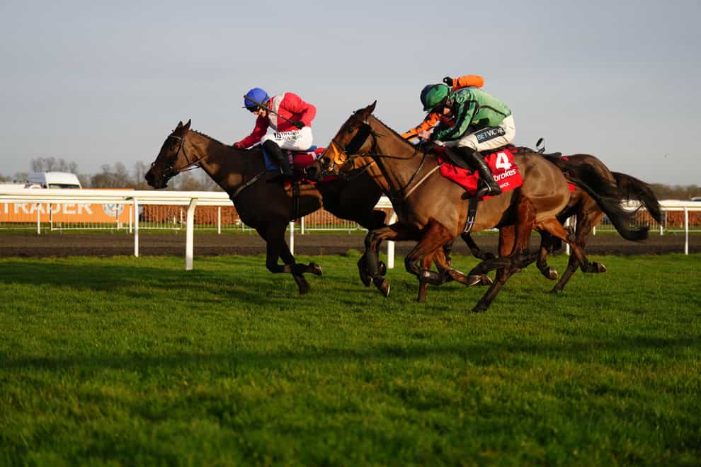 Hewick ridden by Gavin sheehan (right) wins Ladbrokes King George VI Chase on day one of the Ladbrokes Christmas Festival at Kempton Park, Sunbury-on-Thames. Picture date: Tuesday December 26, 2023.