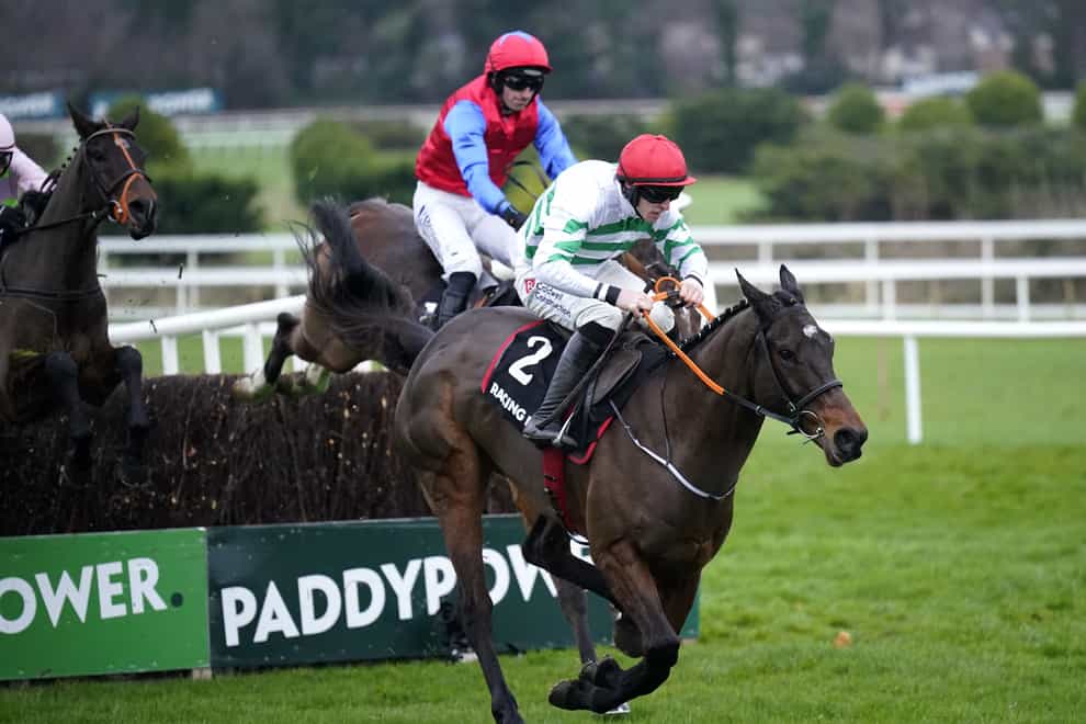 Found A Fifty leads Facile Vega at the final fence at Leopardstown (Niall Carson/PA)