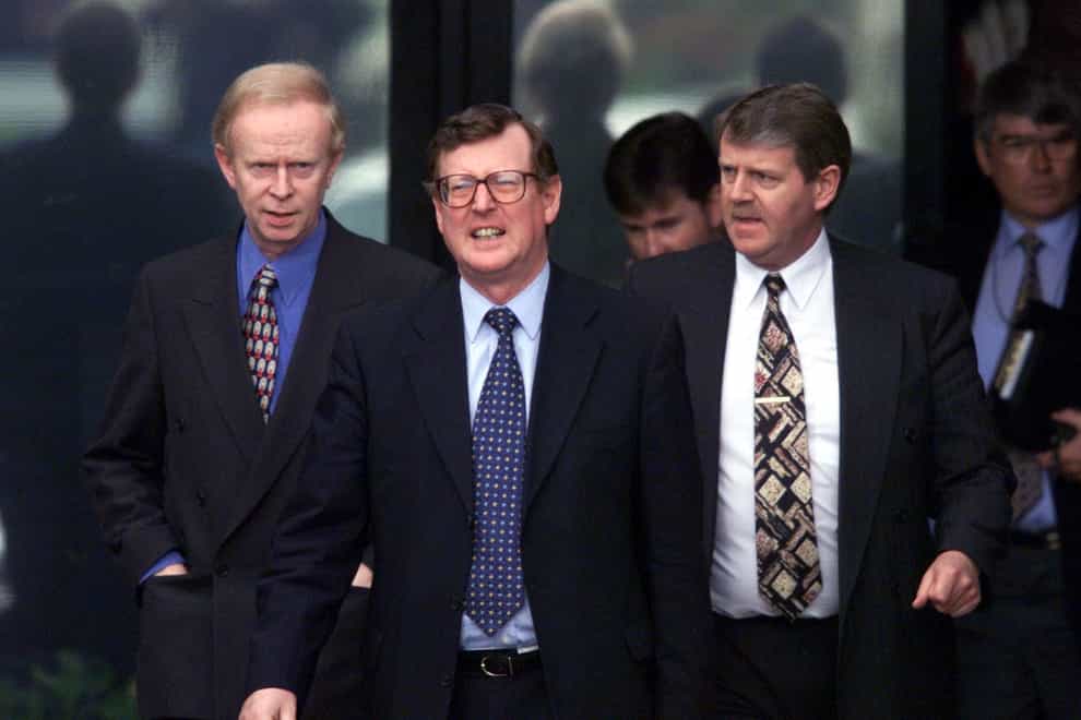 Ulster Unionist leader David Trimble (centre) and party colleagues emerge from Castle Buildings in Belfast in 1999, after the party’s meeting with the British and Irish prime ministers ahead of the June 30 deadline for the Good Friday peace process (Paul Faith/PA)