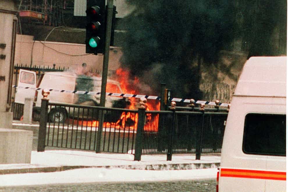 A white van engulfed in flames at Whitehall, London, after a mortar bomb attack on Downing Street (PA)