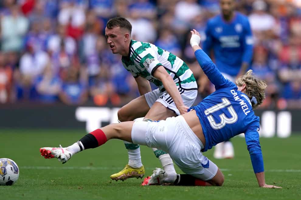 Celtic’s David Turnbull (left) and Rangers’ Todd Cantwell battle for the ball (Andrew Milligan/PA)