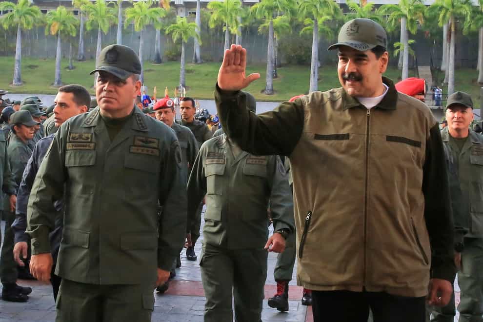 Nicolas Maduro, right, is the president of Venezuela (Jhonn Zerpa/Miraflores Press Office via AP File)