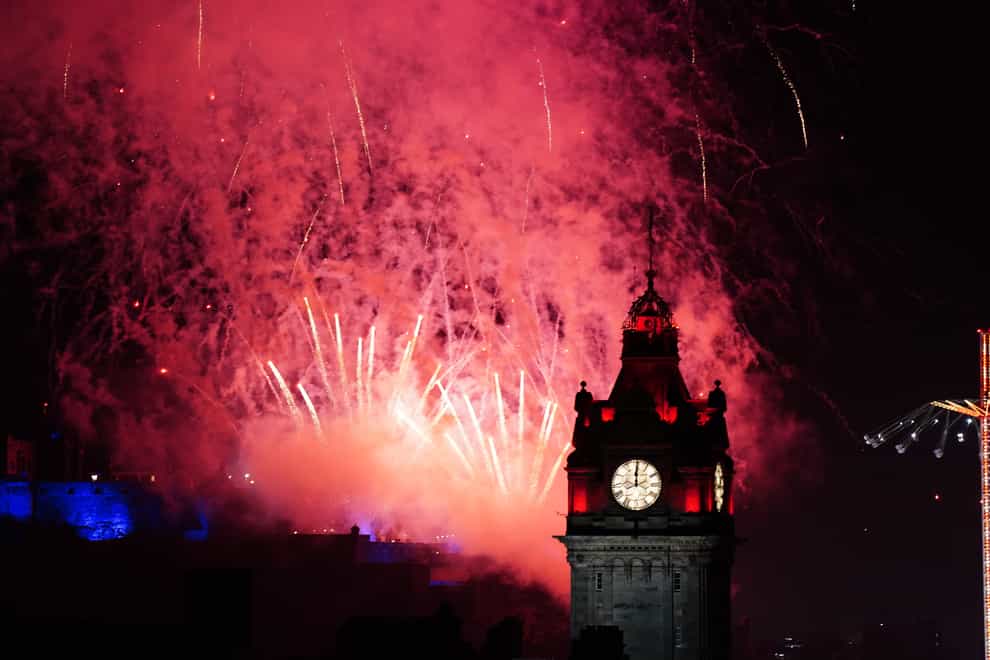 Fireworks explode over Edinburgh Castle during the street party for Hogmanay New Year celebrations in Edinburgh. Picture date: Monday January 1, 2024. (Jane Barlow/PA)