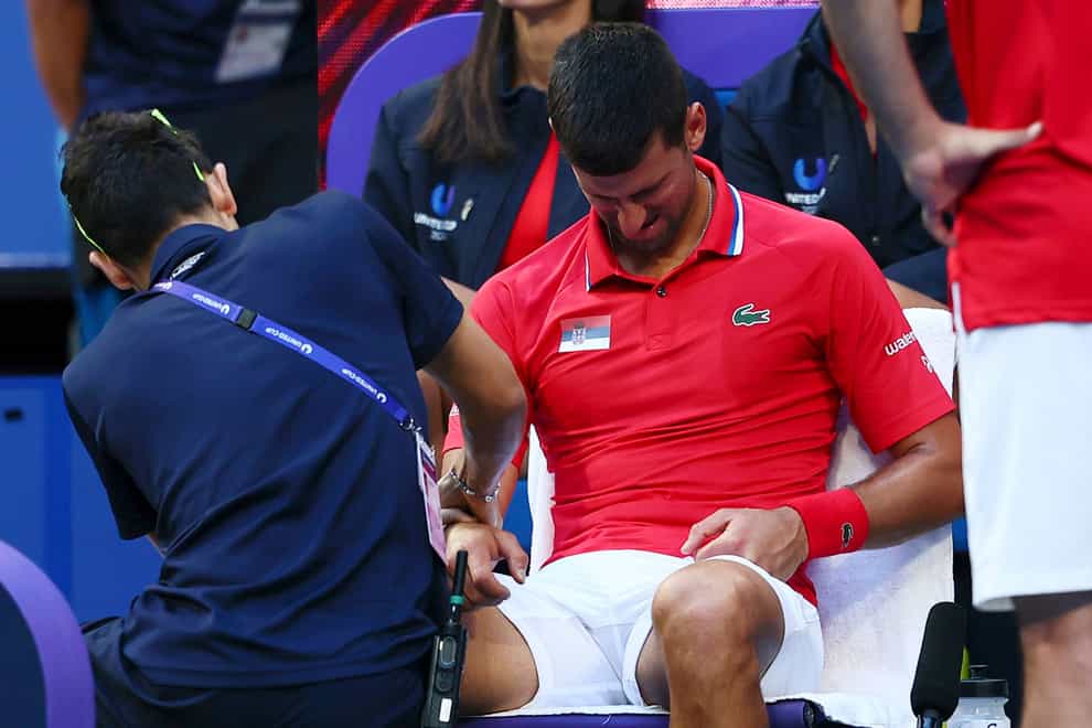 Novak Djokovic needed treatment on his right wrist during his United Cup defeat to Alex de Minaur (Trevor Collens/AP)