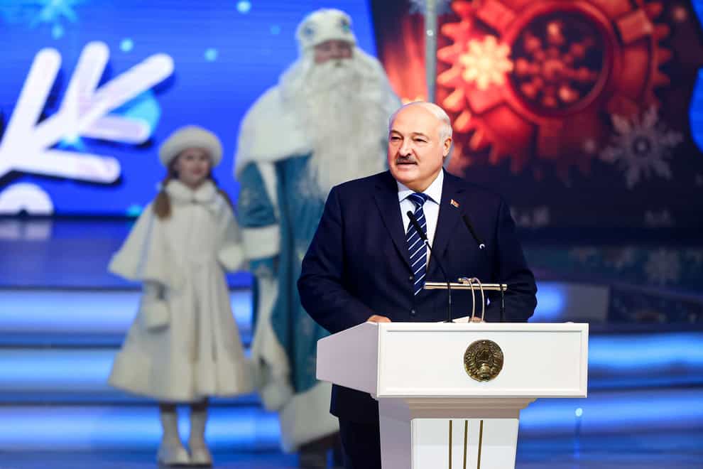 Belarus President Alexander Lukashenko attends a New Year’s Eve children’s charity event (Belarusian Presidential Press Service/AP)