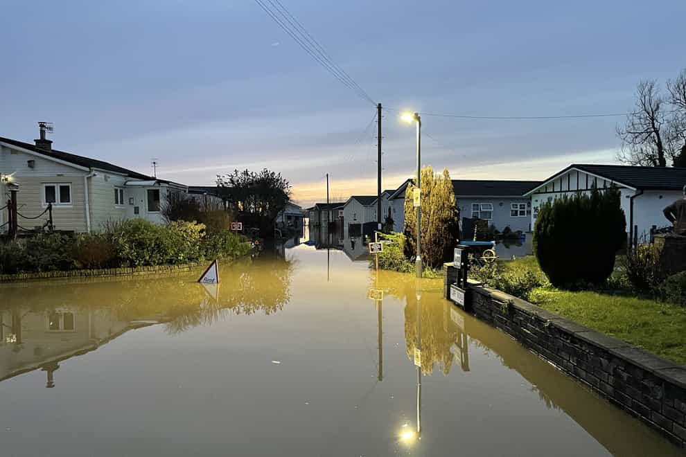 Floodwater surrounds houses in Summer Way, Radcliffe-on-Trent, Nottinghamshire, after a major incident was declared in the county on Thursday due to flooding from the River Trent caused by Storm Henk (Callum Parke/PA)