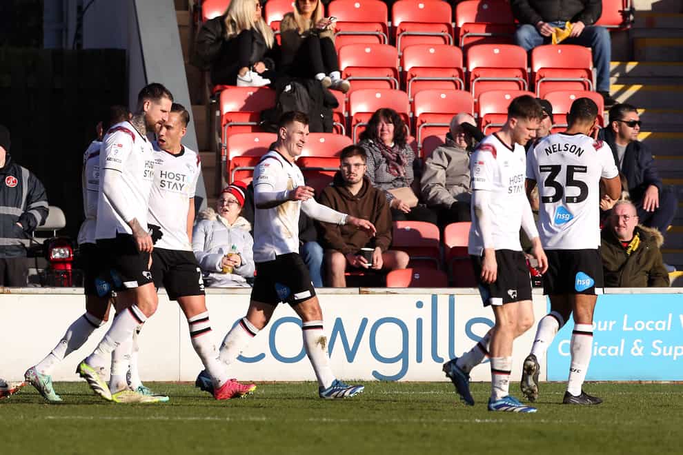 James Collins celebrates scoring Derby’s second (Barrington Coombs/PA)