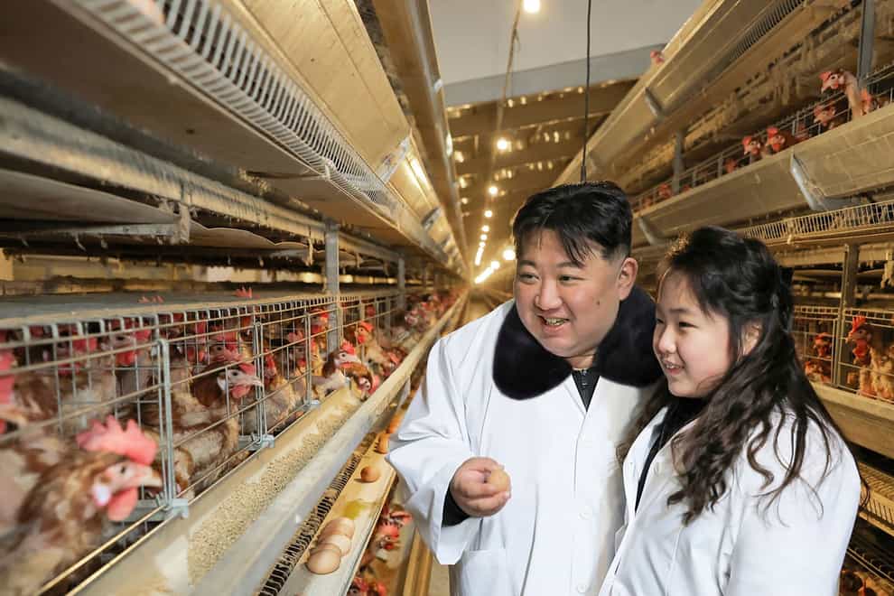 North Korean leader Kim Jong Un and his daughter visited a newly-built poultry factory in Hwangju County of North Hwanghae Province ahead of his birthday (Korean Central News Agency/Korea News Service via AP)