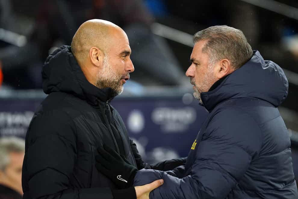 Manchester City manager Pep Guardiola (left) and Tottenham boss Ange Postecoglou will go head to head again in the FA Cup (Martin Rickett/PA)
