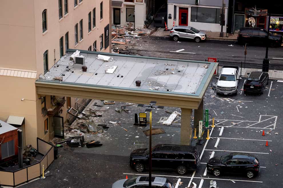 Debris near the Sandman Signature hotel in the wake of the blast (Amanda McCoy/Star-Telegram via AP)