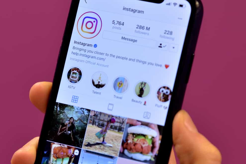 Yhe home page of social media site Instagram on a smartphone (PA)