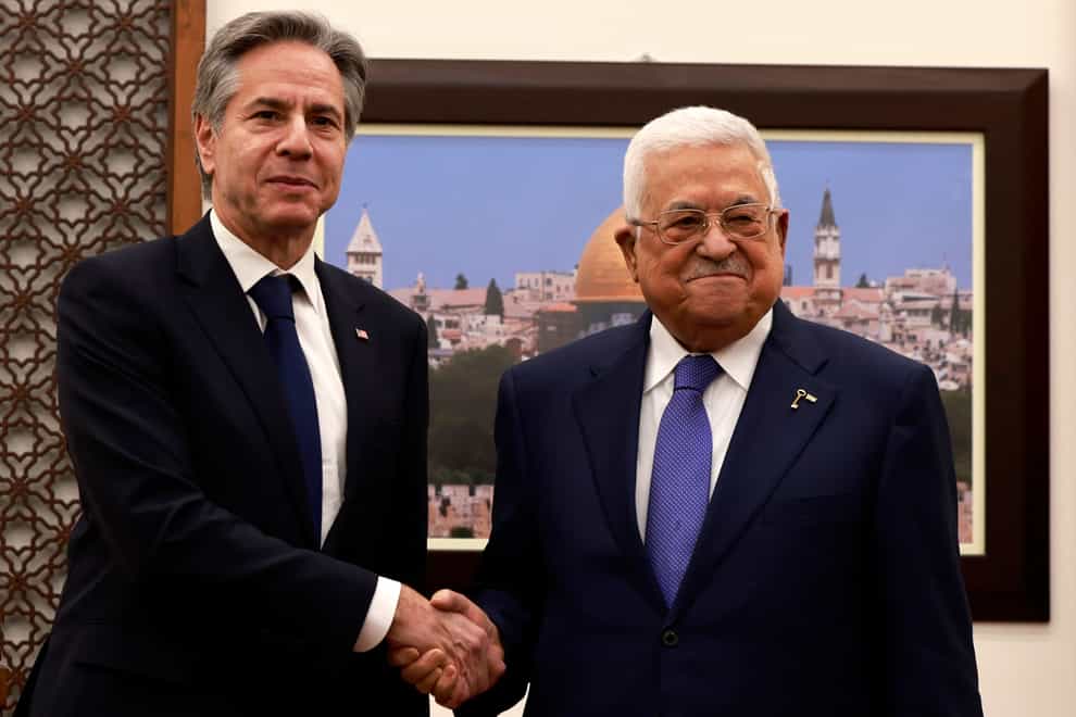 US secretary of state, Antony Blinken, left, meets with Palestinian president Mahmud Abbas, right, in Ramallah in the Israeli-occupied West Bank on Wednesday (Jaafar Ashtiyeh/AP)