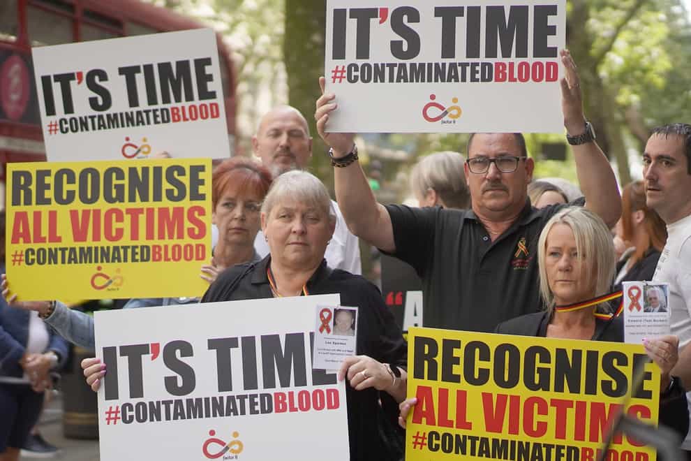 Campaigners gather in Westminster, London, calling for compensation for victims to be authorised by Prime Minister Rishi Sunak. Picture date: Wednesday July 26, 2023. (Victoria Jones/PA)