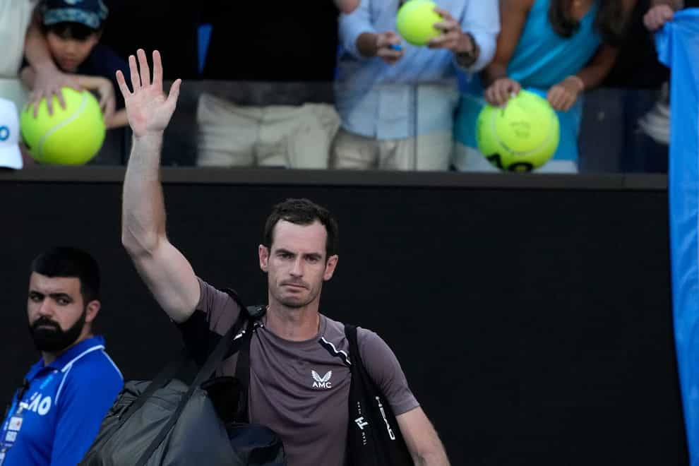 Andy Murray of Britain waves to the crowd following his first round loss to Tomas Martin Etcheverry of Argentina at the Australian Open tennis championships at Melbourne Park, Melbourne, Australia, Monday, Jan. 15, 2024. (AP Photo/Andy Wong)