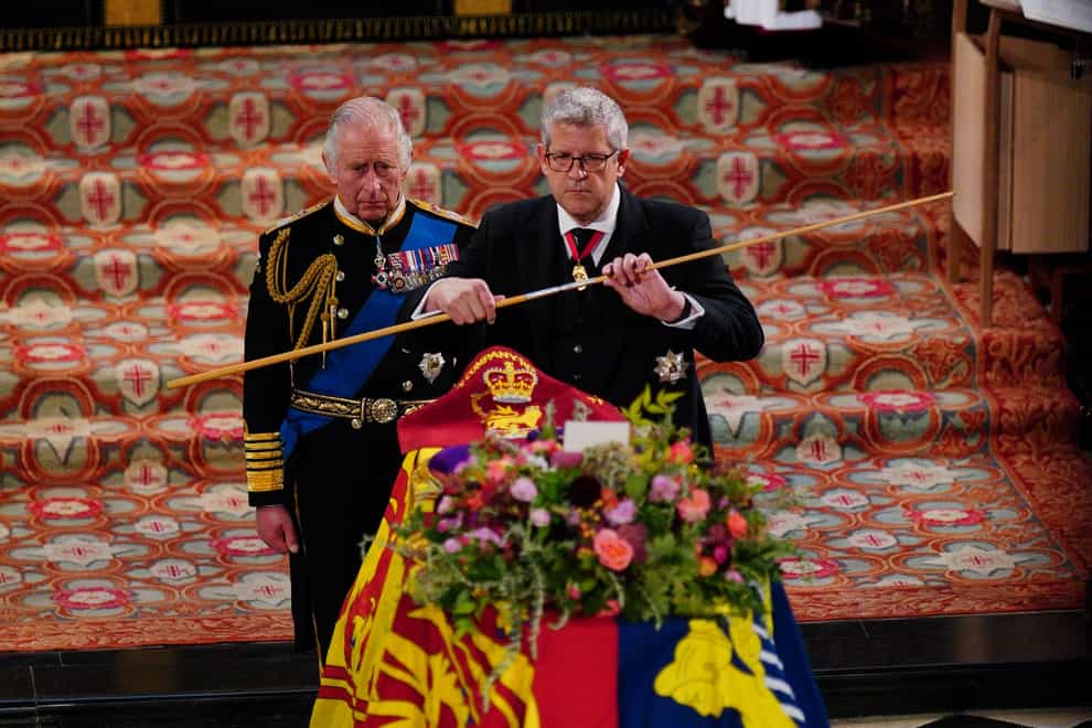The King watches as the Lord Chamberlain breaks his Wand of Office at the committal service for Queen Elizabeth II (Ben Birchall/PA)