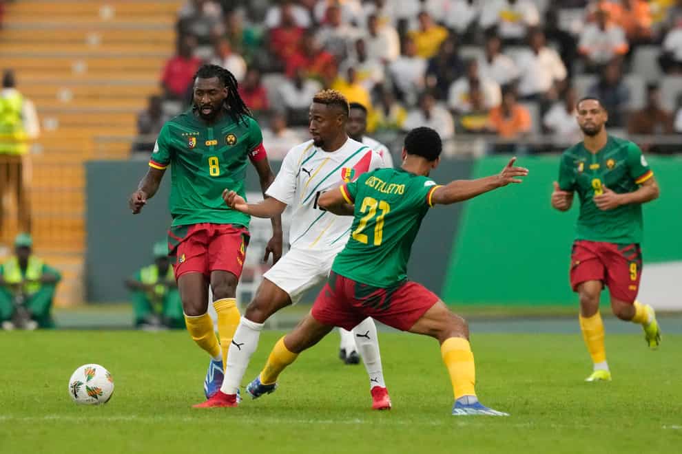 Guinea captain Francois Kamano (centre) was sent off following a VAR review (Sunday Alamba/AP)
