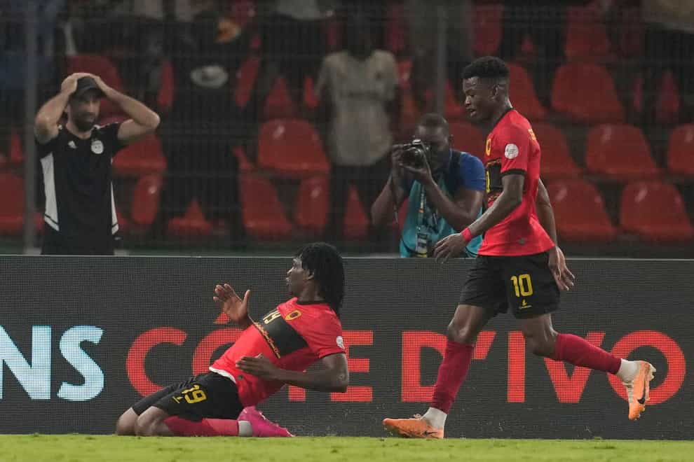 Angola’s Mabululu celebrates his equaliser against Algeria (Themba Hadebe/AP).