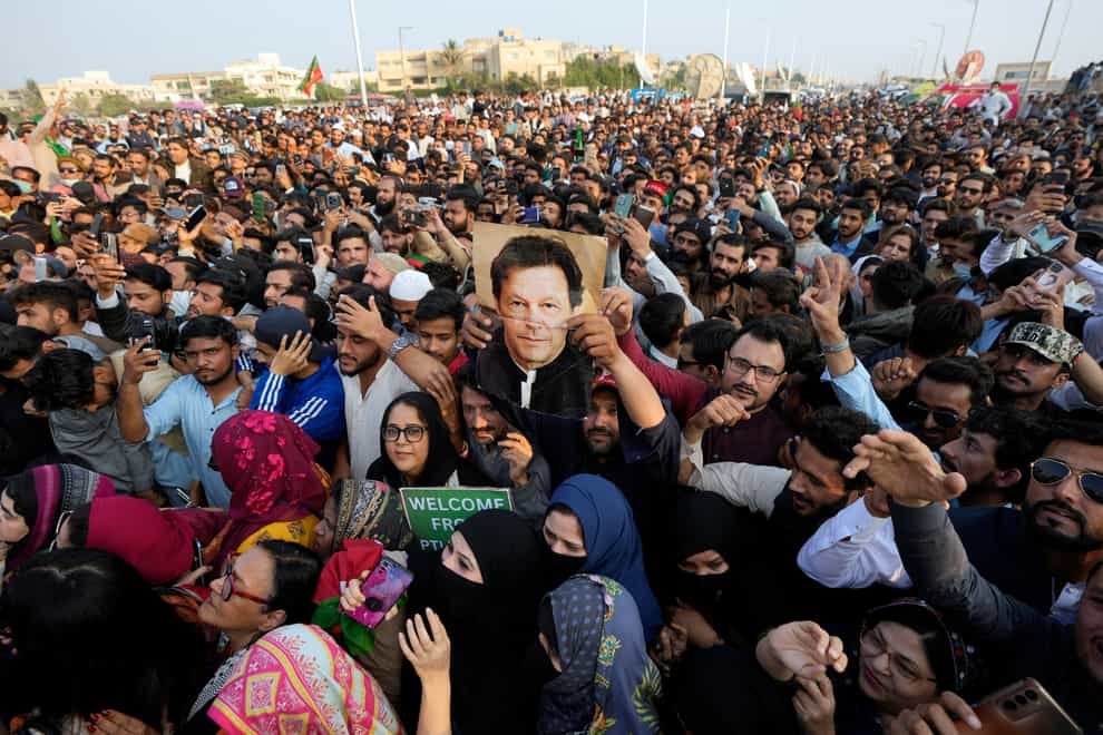 Supporters of Pakistan Tehreek-e-Insaf, a political party of former Pakistani prime minister Imran Khan, hold a rally on Sunday (Fareed Khan/AP)