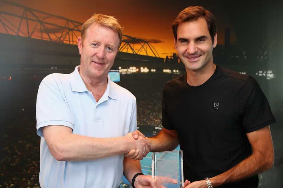 Mike Dickson, the Daily Mail’s long-serving tennis correspondent (pictured with Roger Federer), has died at the age of 59 (handout photo via Associatied Newspapers).