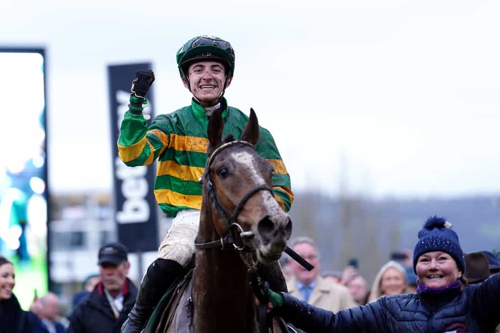 Jockey John Gleeson celebrates after winning the Weatherbys Champion Bumper with A Dream To Share on day two of the Cheltenham Festival at Cheltenham Racecourse. Picture date: Wednesday March 15, 2023.