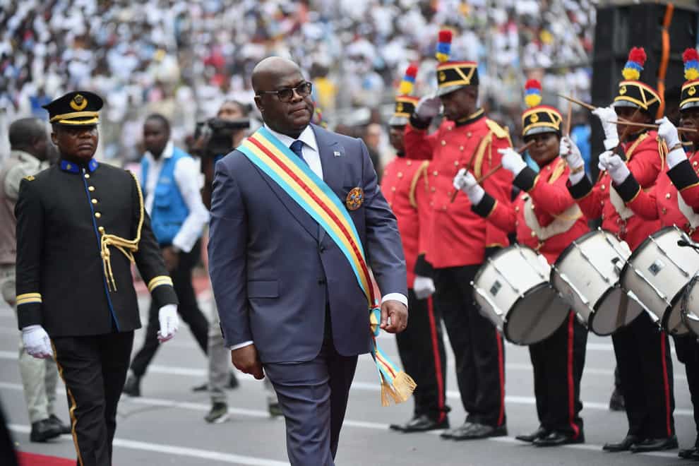Felix Tshisekedi reviews an honour guard during his swearing-in ceremony (Guylain Kipoke/AP)