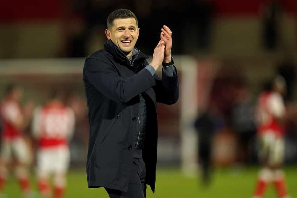 Portsmouth manager John Mousinho claps to the fans after his teams 1-0 win against Fleetwood Town, during the Sky Bet League One match at Highbury Stadium, Fleetwood. Picture date: Saturday January 20, 2024.