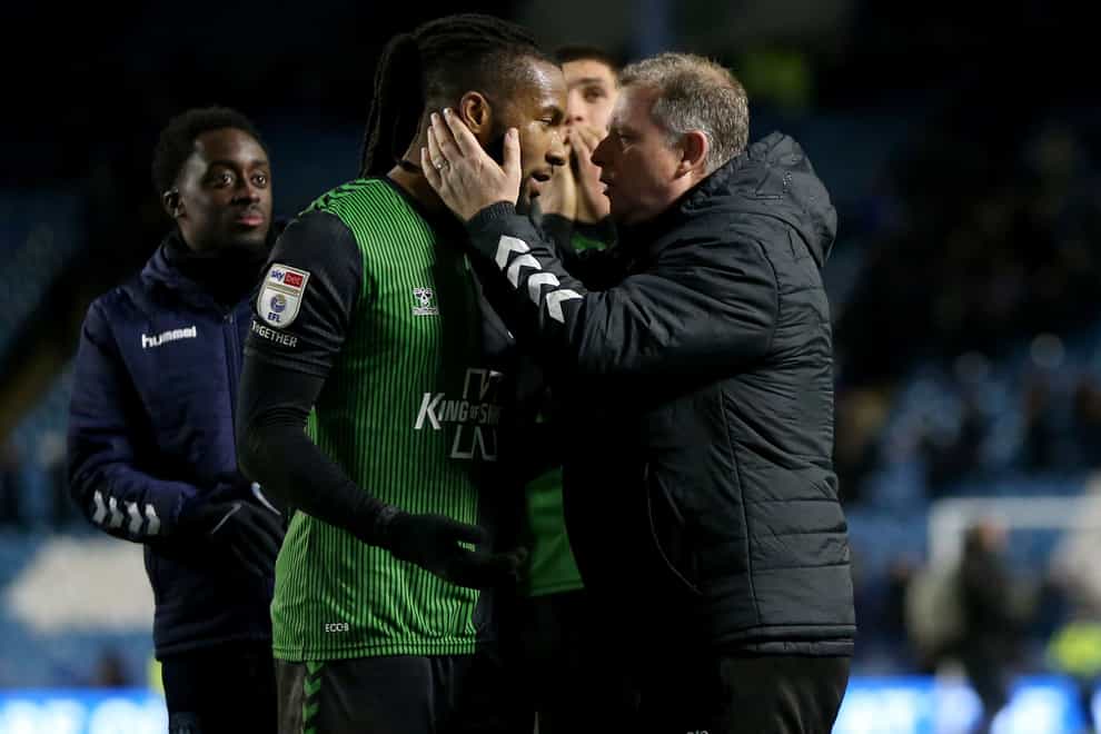 Kasey Palmer (left) and manager Mark Robins at the end of the game (Barrington Coombs/PA)