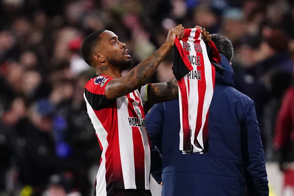 Brentford’s Ivan Toney celebrates scoring their side’s first goal of the game, and holds up a shirt dedicated to his uncle Brian during the Premier League match at the Gtech Community Stadium, London. Picture date: Saturday January 20, 2024.