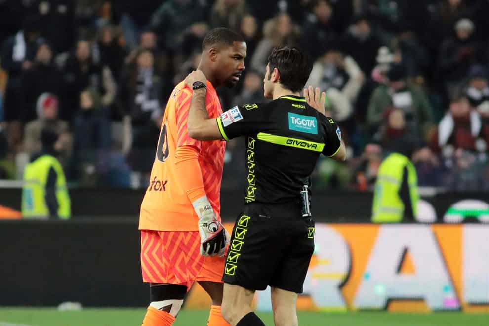 AC Milan goalkeeper Mike Maignan was racially abused at Udinese (Andrea Bressanutti/AP)