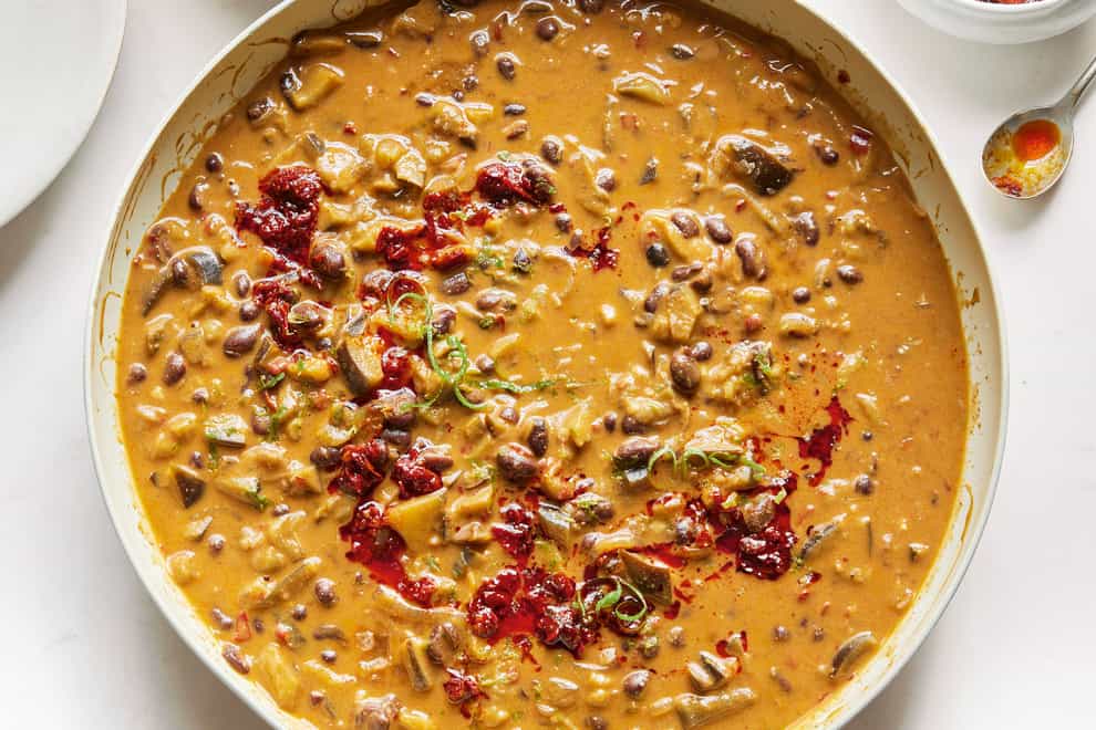 Creamy black bean and harissa stew from Deliciously Ella: Healthy Made Simple (Clare Winfield/PA)